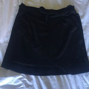 Living Doll black mini wrap skirt from dilliards